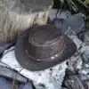 Rugged Australian Hat - Brown Leather Hat The Wilds, by Wombat – Distressed Bush Hat | Rugged Australian Style | Unisex Hats Whether you're camping, hiking, or just exploring the great outdoors, The Wilds brown Leather Hat is your perfect companion. This rugged, Australian-inspired bush hat is crafted with soft, foldable full grain leather, making it the perfect hat for travel and adventure.