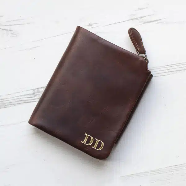 brown leather wallet with coin zipped pocket initialled in gold foil