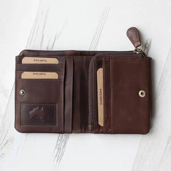 side view of a brown leather wallet with coin zipped pocket