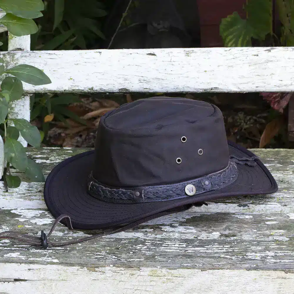 Adventure-ready Waterproof Waxed Cotton Hat — foldable, lightweight, and durable with UPF 50+ protection. Perfect for hiking, travel, and outdoor life. Whether there’s a bit of drizzle or lovely rays of sun, you’ll be adventure-ready! Wombat