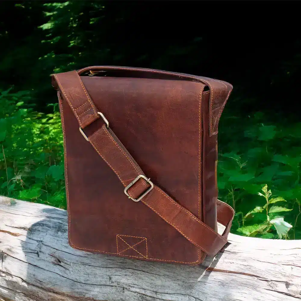 wombat Oiled Leather Flapover Messenger Bag showing leather shoulder strap