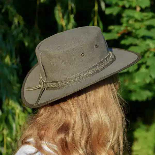 woman wearing a wombat the trail thick canvas outdoor hat