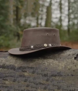 Australian Hat. Step into the wild with The Prospector Cowboy Hat by Wombat, a premium soft brown leather hat designed for those who embrace the great outdoors. Whether you're fishing, hiking, trekking, or enjoying a walk with your dog, this hat offers unmatched comfort, style, and protection from the elements.