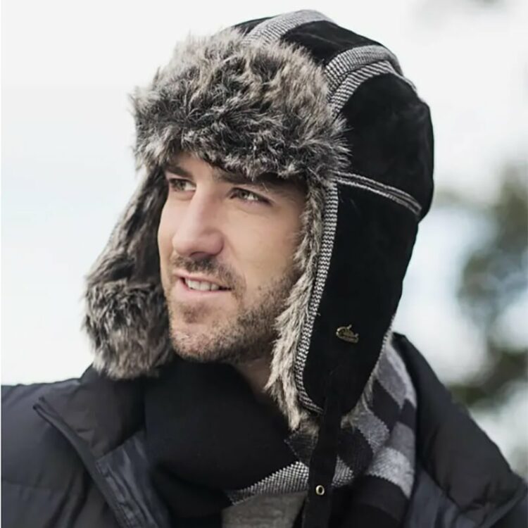 man wearing a leather Trapper Hat