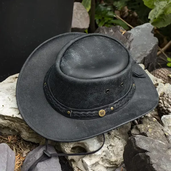 black leather hat on a stone background