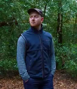 man wearing a wombat navy outdoor gilet