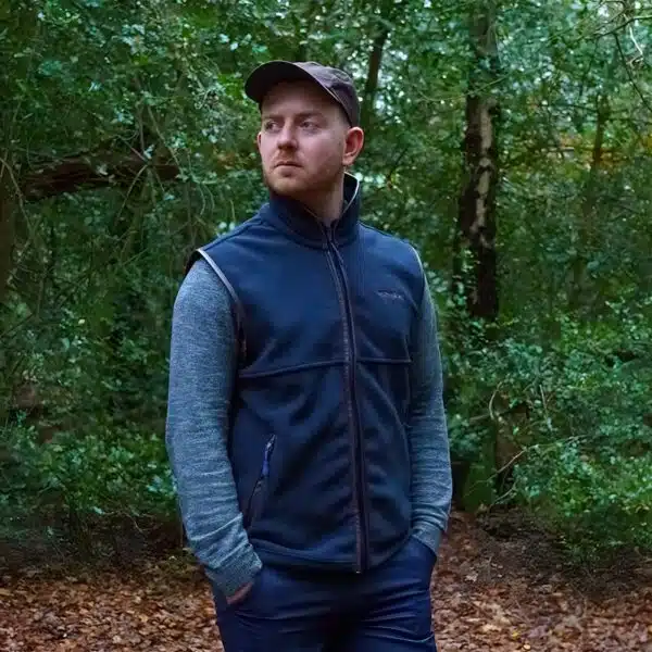 man wearing a wombat navy outdoor gilet