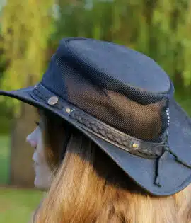 woman wearing a wombat the wilds air back leather hat with mesh sides