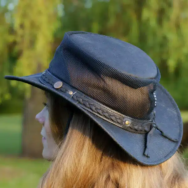 woman wearing a wombat the wilds air back leather hat with mesh sides