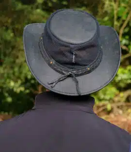 man wearing a wombat the wilds air back leather hat with mesh sides