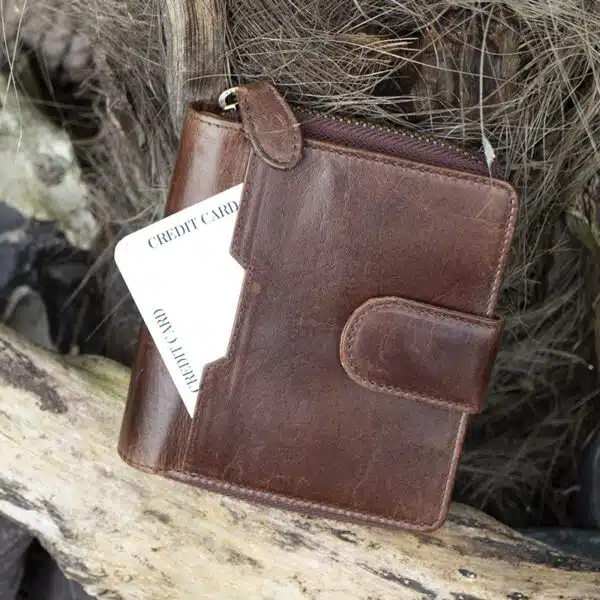 Womans brown vintage style leather bifold purse Wallet with a tab opening showing front card pouch