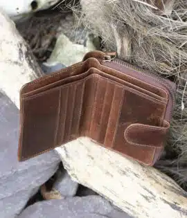 Womans brown vintage style leather bifold purse Wallet open showing card slots and note pockets