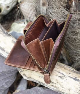 Womans brown vintage style leather bifold purse Wallet showing rear coin purse 2 sections and a chunky metal zip