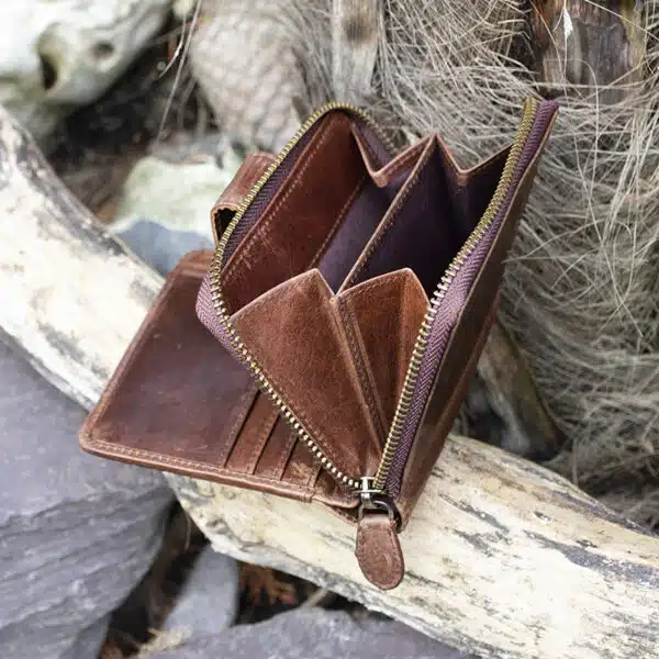 Womans brown vintage style leather bifold purse Wallet showing rear coin purse 2 sections and a chunky metal zip