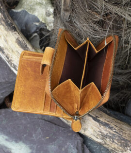 Womans tan vintage style leather bifold purse Wallet showing rear coin purse 2 sections and a chunky metal zip