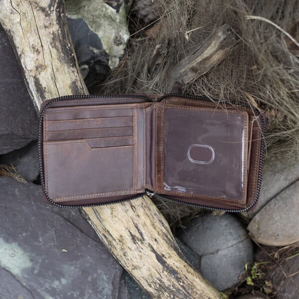 mens large leather zip around wallet in brown vintage style leather showing card pouches and ID window