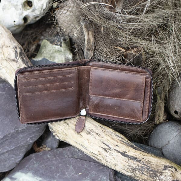 mens large leather zip around wallet in brown vintage style leather showing card slots and coin pocket