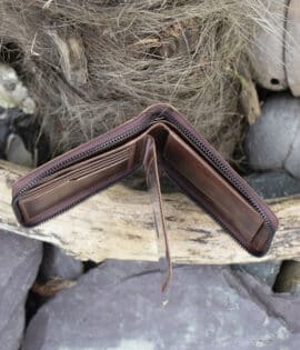 mens large leather zip around wallet in brown vintage style leather showing note pockets