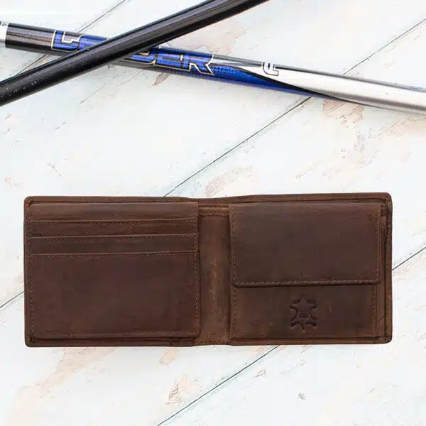 mens brown rugged wallet open on wood background