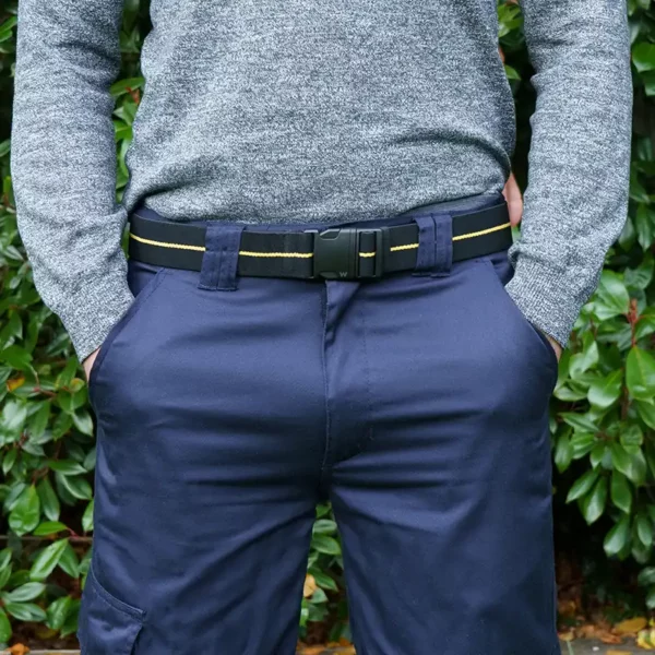 man wearing a black fabric belt stretch belt