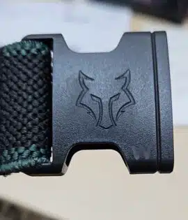 embossed wolfs head on a belt buckle