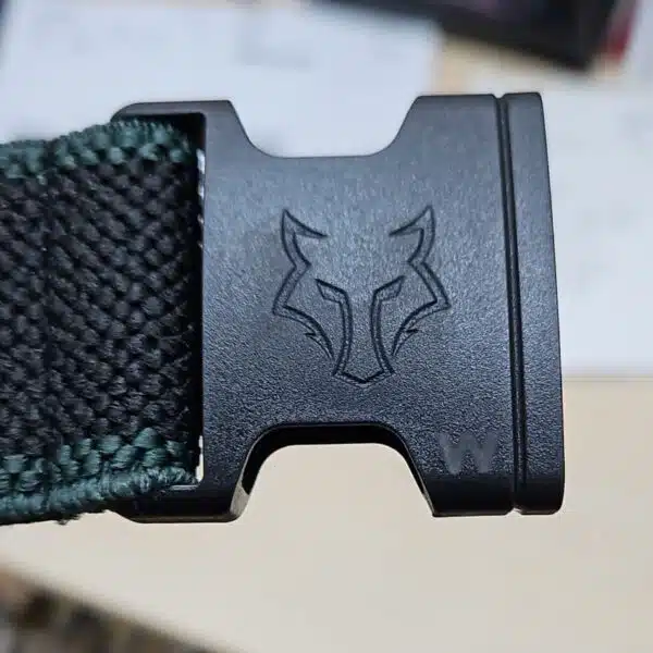 embossed wolfs head on a belt buckle