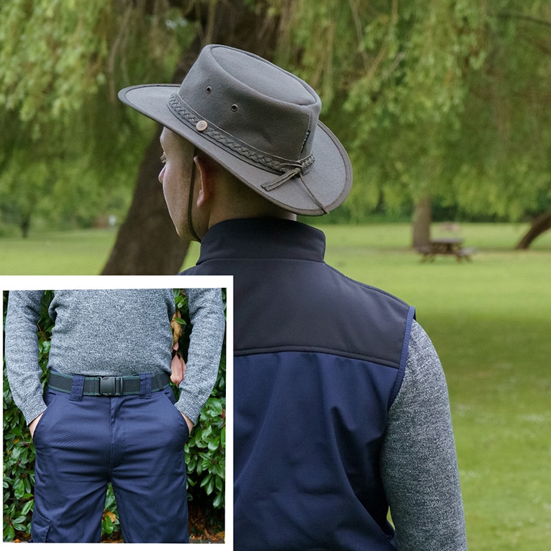 man wearing a wombat hat and belt