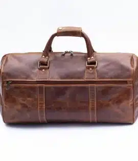 Leather travel bag side pockets and strap