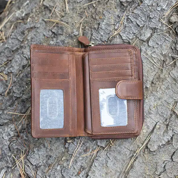 ladies purse in brown shot on a log background