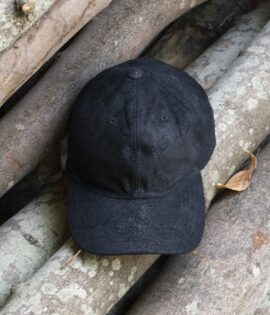 black leather cap with a weathered finish uv protection