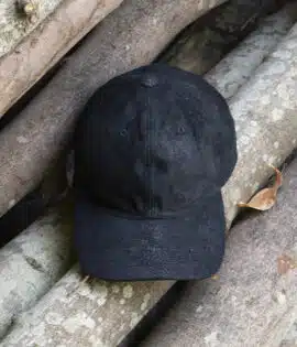 black leather cap with a weathered finish uv protection