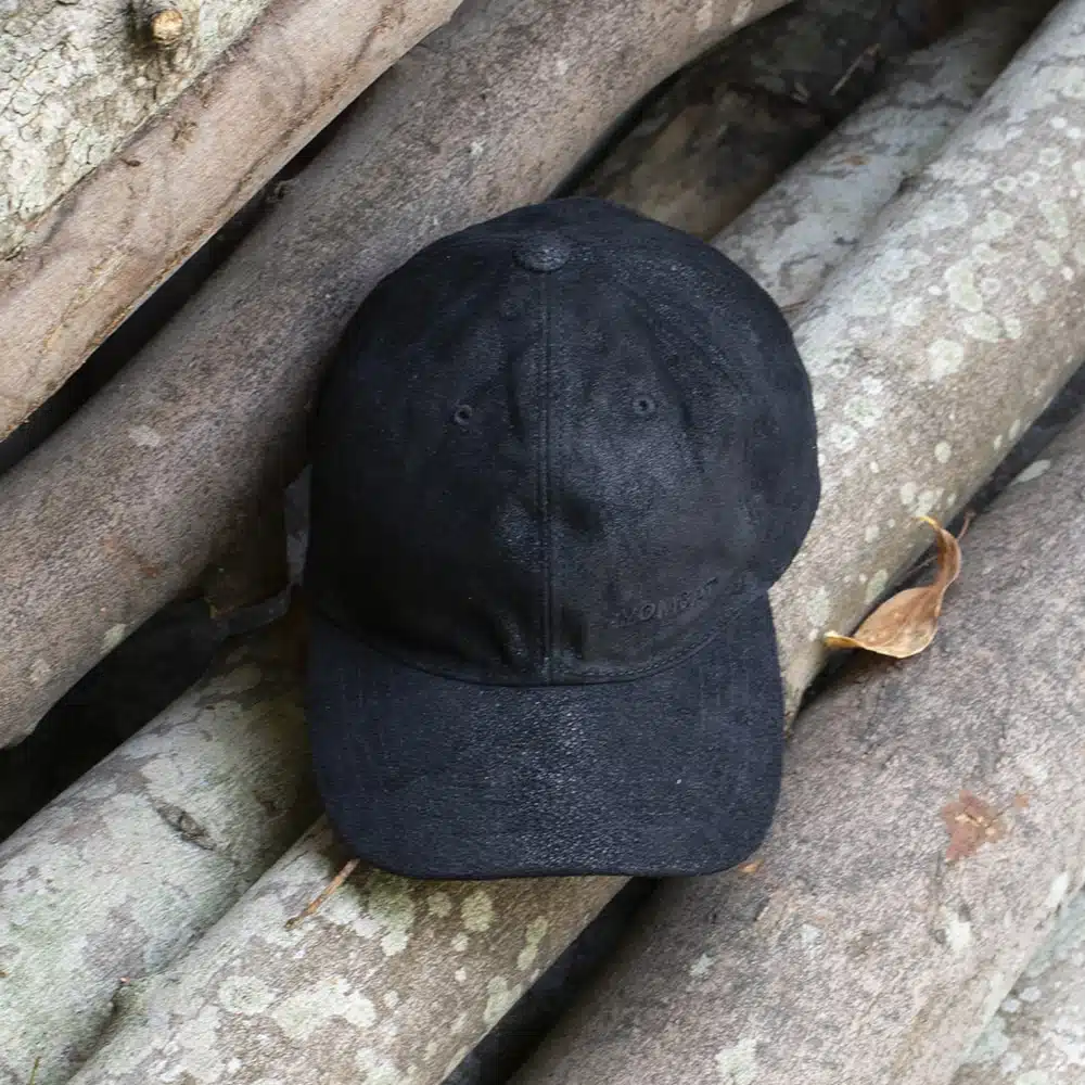 black leather cap with a weathered finish uv protection