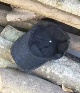 black leather hat showing the black cotton lining