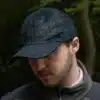 man wearing a black leather cap by wombat