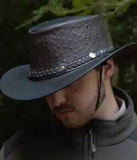 man wearing a black leather hat
