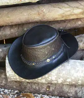 wombat western cowboy hat in black leather on a log
