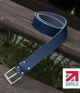 blue handmade in britain leather belt on a wooden step