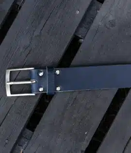 premium blue english hide leather belt on a wooden step