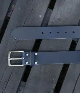 premium blue english hide leather belt on a wooden step