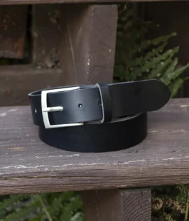 premium black english hide leather belt on a wooden step