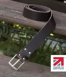 dark brown handmade in britain leather belt on a wooden step