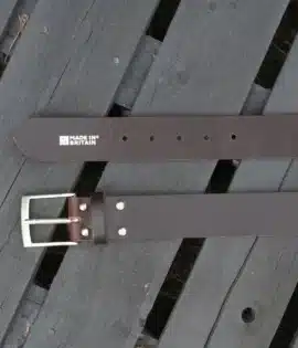 premium dark brown english hide leather belt on a wooden step showing made in britain stamp