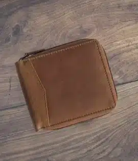 Handcrafted men’s oiled leather wallet with RFID protection and personalization options. Durable, stylish, and made for adventure.