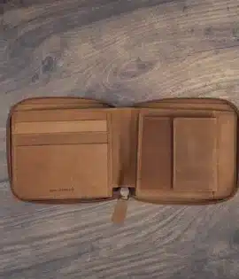 Made from premium oiled leather, this wallet blends rugged durability with timeless sophistication. It’s designed for the man who values style, practicality, and individuality — complete with optional personalization to make it truly his own.