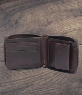 Handcrafted men’s oiled leather wallet with RFID protection, zip-around security, and smart organization. Durable, stylish, and built for adventure.
